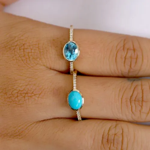 Oval cut 6x8 Blue Topaz Ring